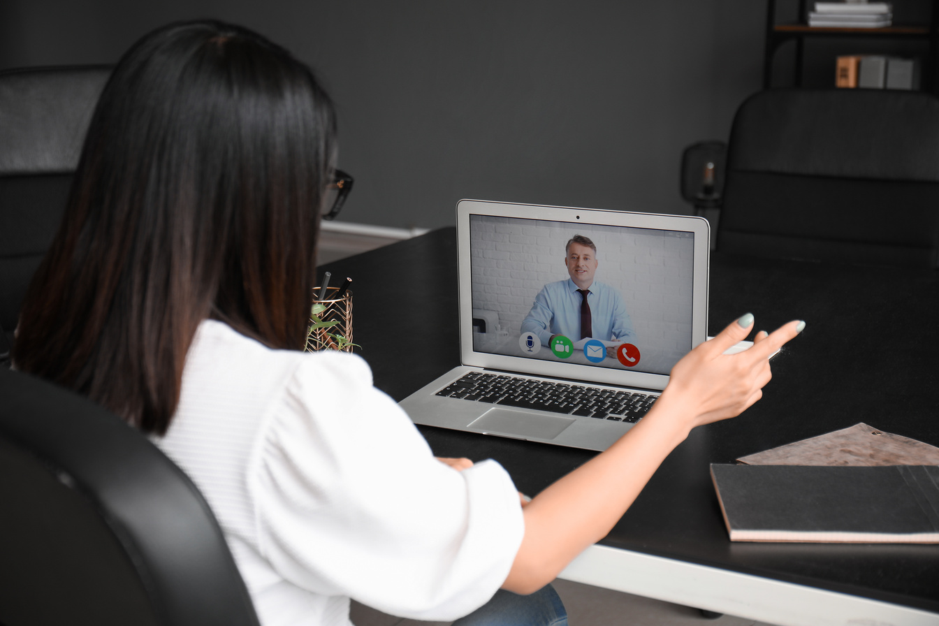 Female HR Specialist Interviewing Candidate Online